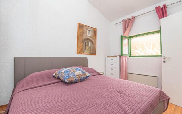 Awesome Home in Jezera with Hot Tub, WiFi & 1 Bedrooms