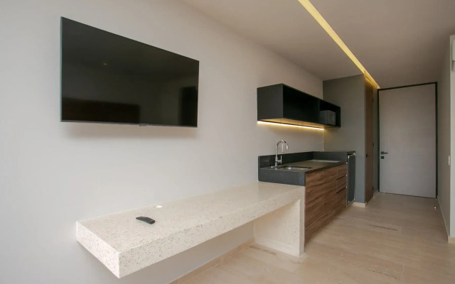 Kaab by the Beach. Condo with roofpool