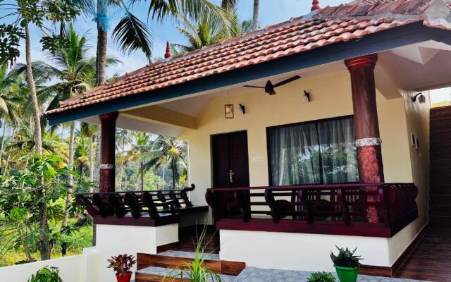 Maadathil Cottages