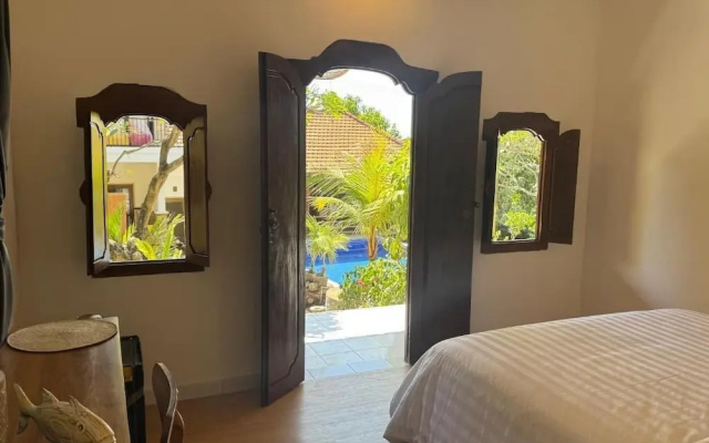 Tulambubu Dive Resort – Guest Rooms – Purwakerti