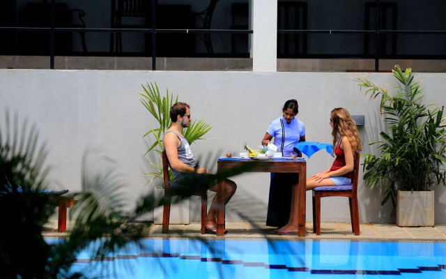 The Blue Wave Hotel