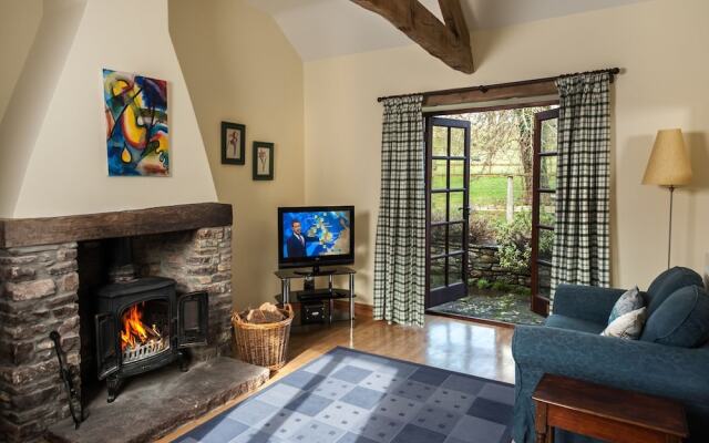 Cottage With Folding-doors in a Calm Environment Surrounded by Farming Fields