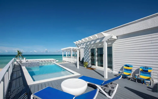 Secluded Luxury: New Beachfront Home With Pool