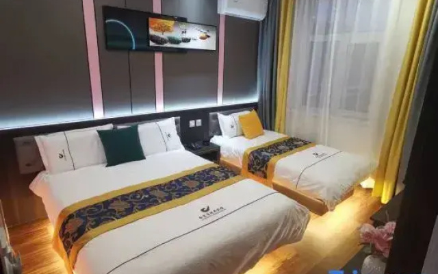 Qitaihe Jinwowo Fashion Hotel