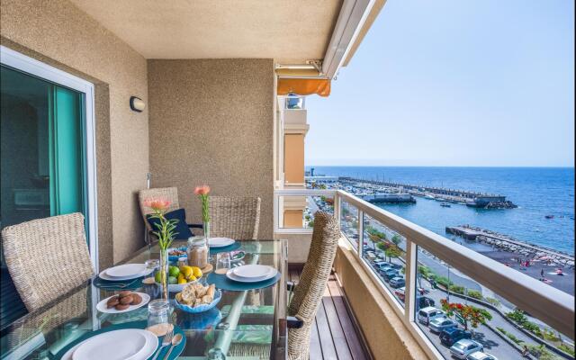 Spacious beach apartment with private parking