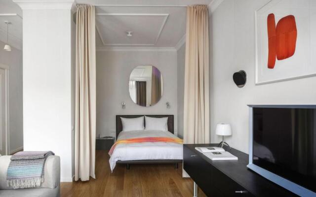 Design Central Studio Apartment with Balcony by Hostlovers