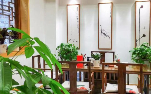 凤凰一树红棠精品客栈