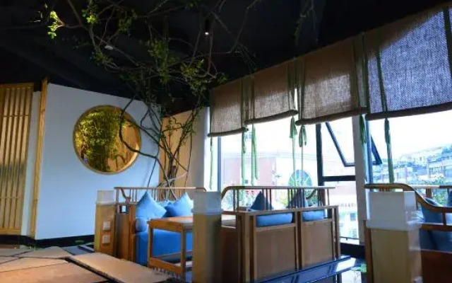 Youjia Traders Hotel (Pengzhou Longxing Temple)