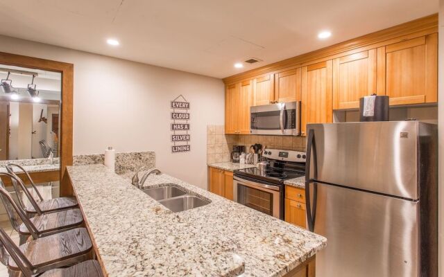 Your own balcony, full kitchen in Canyons Village by RedAwning