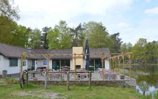 Detached Bungalow With Lovely Covered Terrace in a Nature Rich Holiday Park