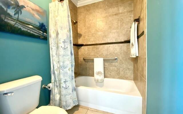 Wonderful Tropical Condo with Beach and Fitness Center Access - Unit 0102 by RedAwning