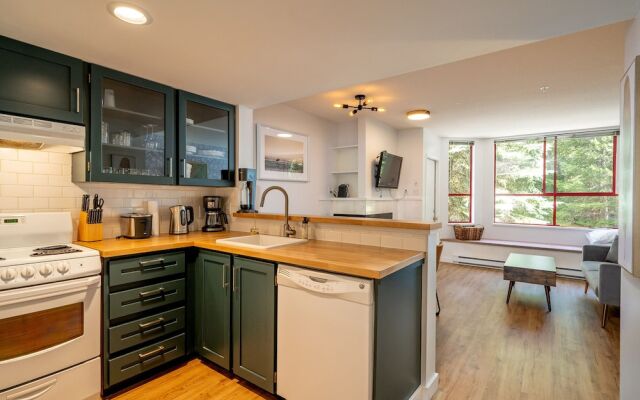 Cozy Creekside Two-Storey Condo