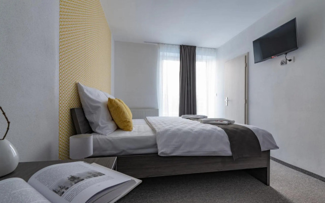 Penzión pod brezami**