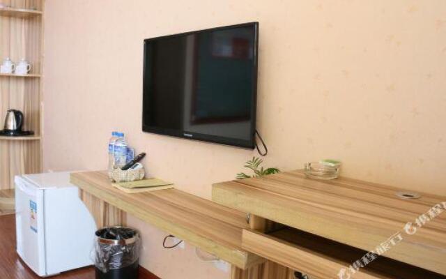 Xishuangbanna Shibao Business Hotel