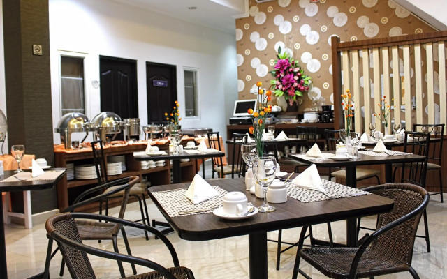 Airy Mapanget AA Maramis Manado