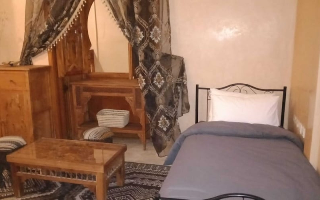 "room in Guest Room - Riad Lakouas Triple Room With Pool View"