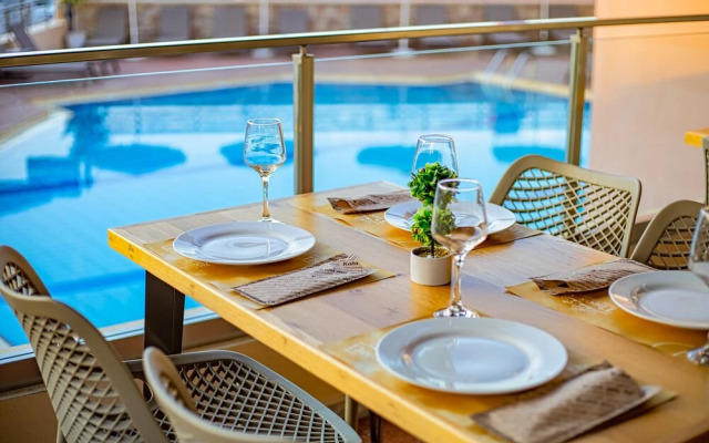 Theos village apartments