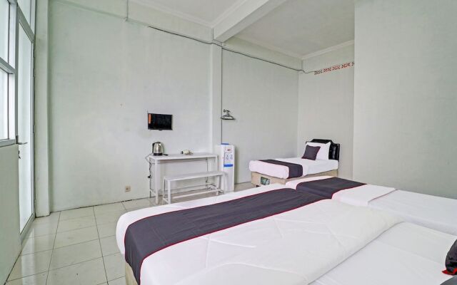 Capital O 91466 Hotel Neu Backpacker Tf Syariah (smk Tb)