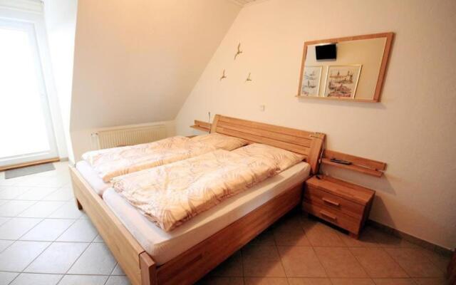 Ferienwohnung-10-mit-Balkon-Garten-Landhaus-Hubertus-Duhnen