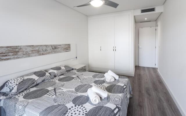 BREZO - Apartment with shared pool in Oliva Nova . Free WiFi