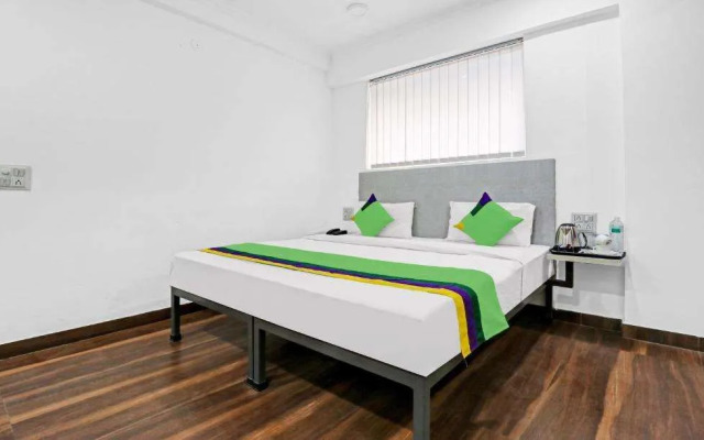 Treebo Grand Town House