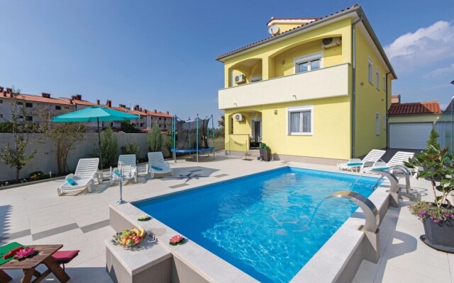 Beautiful Home in Peroj With 6 Bedrooms, Outdoor Swimming Pool and Wifi