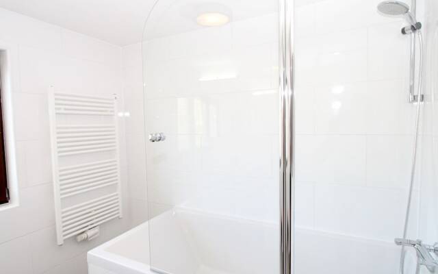 Quaint Chalet in Kirchberg with Terrace, Garden, Ski Storage