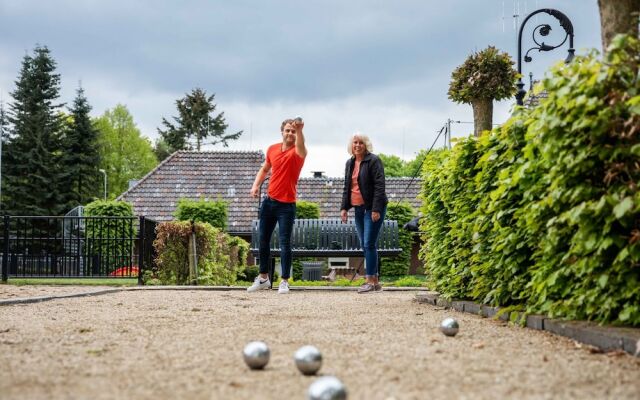 Tidy chalet with garden and WiFi, close to Park De Veluwe