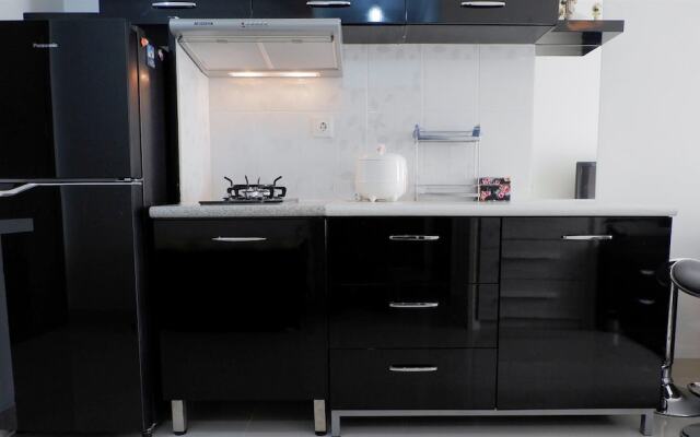 Homey and Minimalist Signature Park Grande Apartment