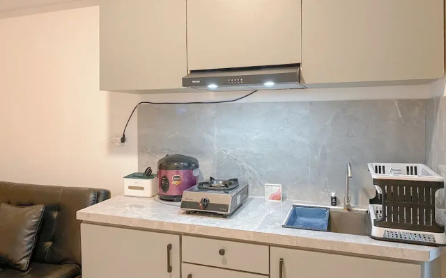 Minimalist and Cozy 1BR Green Bay Pluit Apartment