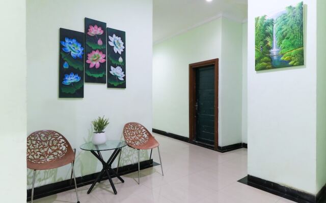 Labuana Homestay & Cafe Garden by ZUZU