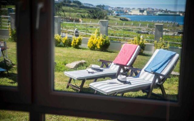 Chalet Pareado con Jardin en 1ª Linea de Mar