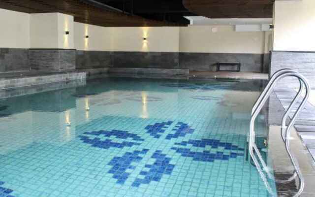 Prime & Comfy Studio @ Tamansari La Grande Apartment By Travelio