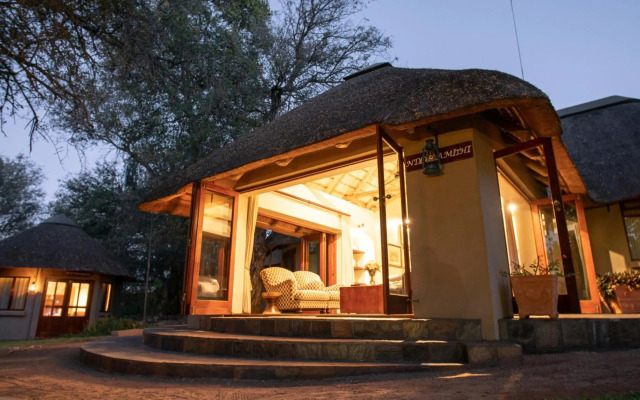 Ivory Wilderness River Rock Lodge