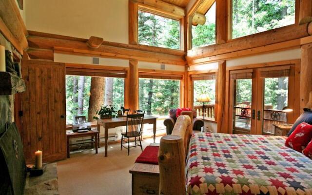 Red Roof On The River by Stewart Mountain Lodging