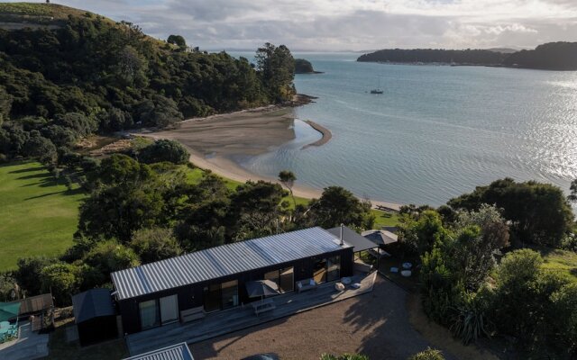 Wharetana Bay Villa with beach walkway