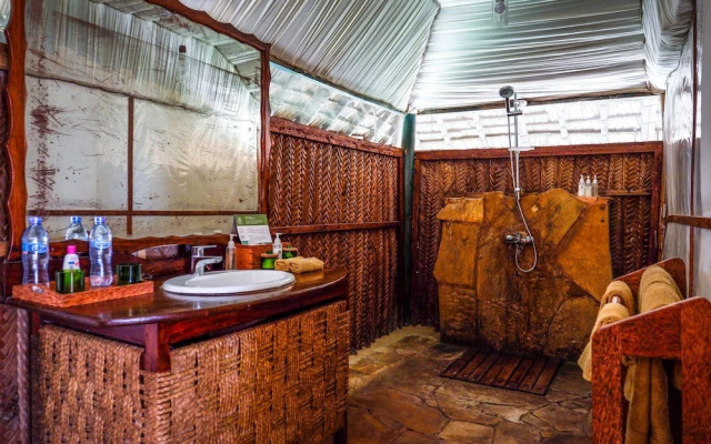 Saadani Safari Lodge - bush, river, beach