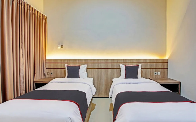 Capital O 91166 El Malik Hotel