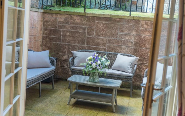 JOIVY Luxury Carlton Terrace Main Door Apartment