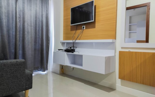 Homey and Comfy 2BR at Vida View Apartment