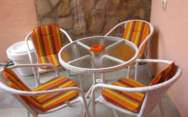 Orange Flower Apartments