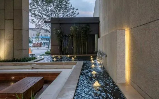 City Xinjia Apartment Hotel