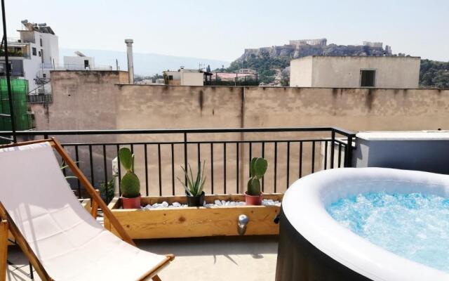 AS jacuzzi on privet roof top with acropolis view