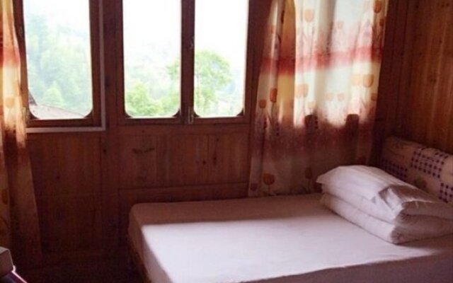 Longsheng Zhaihualou Inn