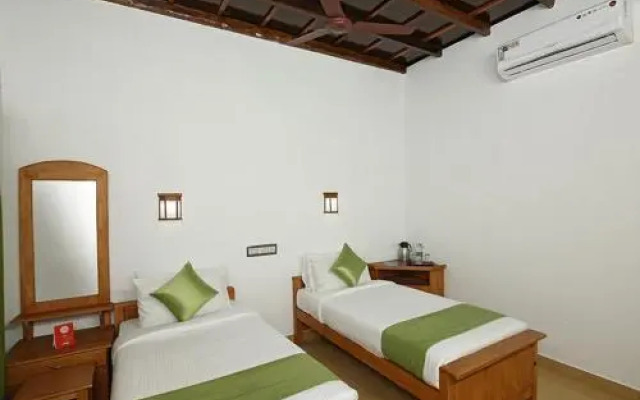 Coir Village Lake Resort by OYO