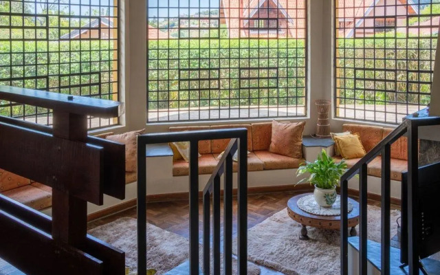 Casa com forno de pizza e vista para as montanhas