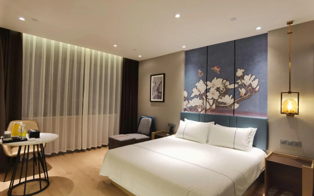Magnotel Hotel (Anxi Tea Capital Baolong Plaza)