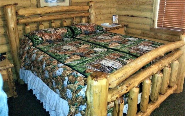 Wolf Den Log Cabin Motel and RV Park