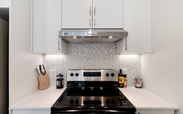 Discover Little Italy From a Bright Apartment