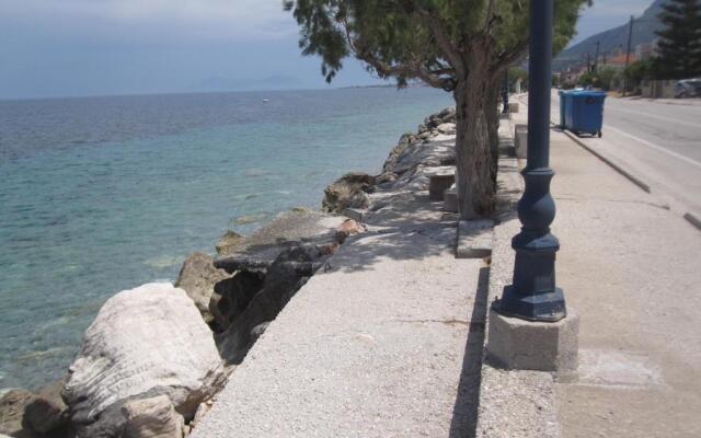 Traditional Greek Stone house by the sea